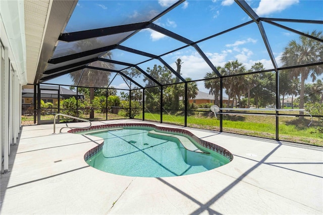 251 Broadmoor Ln, Rotonda West, FL 33947 - outdoor pool with a patio and glass enclosure