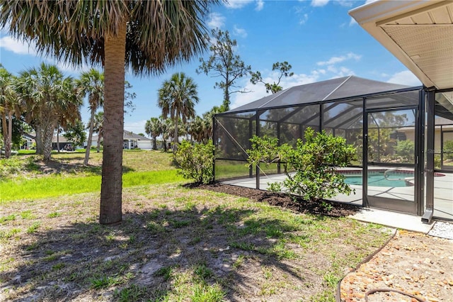 251 Broadmoor Ln, Rotonda West, FL 33947 - view of yard featuring an outdoor pool and a patio area