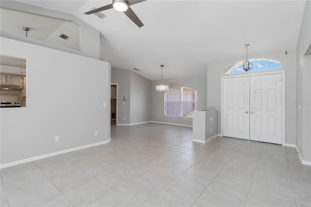 251 Broadmoor Ln, Rotonda West, FL 33947 - entrance foyer with lofted ceiling, a chandelier, healthy amount of natural light, light tile patterned floors, and ceiling fan