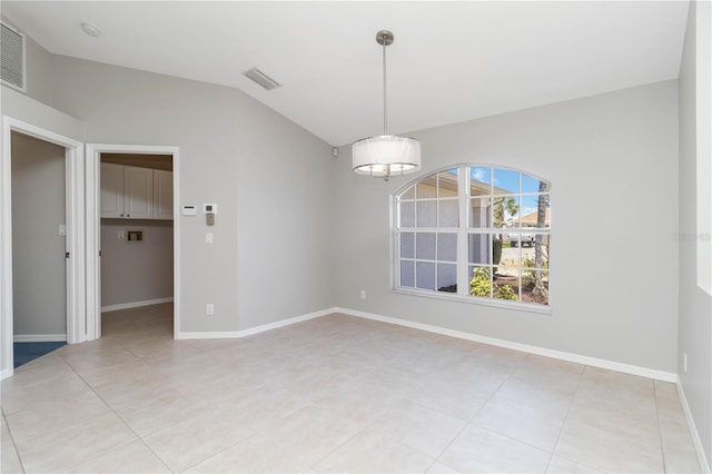 251 Broadmoor Ln, Rotonda West, FL 33947 - unfurnished room with lofted ceiling, light tile patterned floors, and baseboards