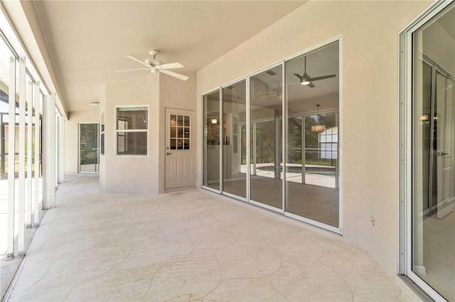 251 Broadmoor Ln, Rotonda West, FL 33947 - unfurnished sunroom with a ceiling fan and vaulted ceiling