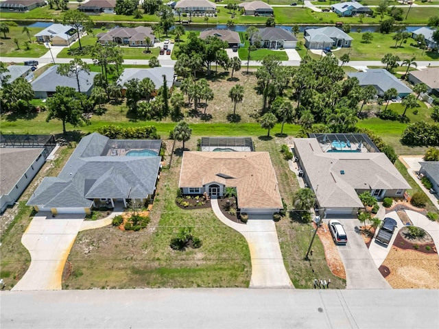 251 Broadmoor Ln, Rotonda West, FL 33947 - aerial perspective of suburban area featuring a nearby body of water