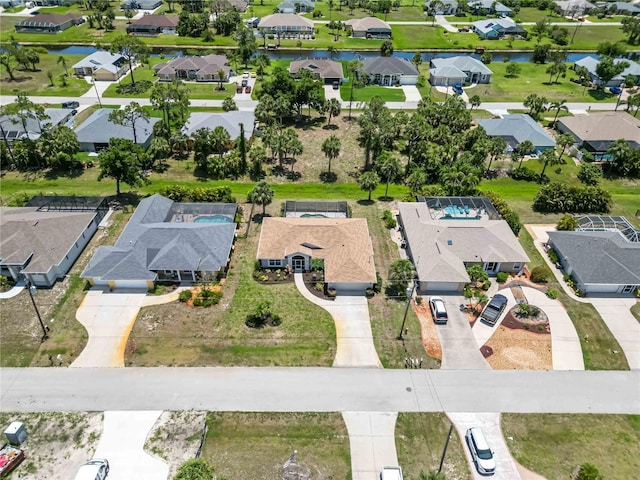 251 Broadmoor Ln, Rotonda West, FL 33947 - aerial view of residential area featuring a nearby body of water
