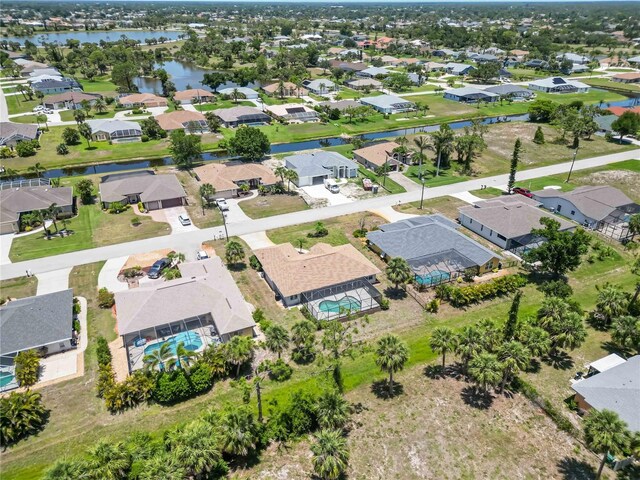 251 Broadmoor Ln, Rotonda West, FL 33947 - aerial view of residential area featuring a nearby body of water