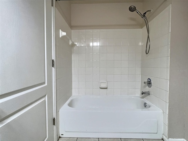 4142 Central Sarasota Pkwy Unit 1423, Sarasota, FL 34238 - bathroom featuring washtub / shower combination and tile patterned flooring