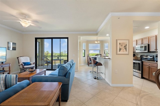 7005 River Hammock Dr Unit 203, Bradenton, FL 34212 - living area featuring light tile patterned floors, ornamental molding, baseboards, and ceiling fan