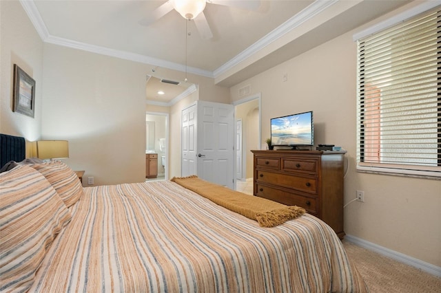 7005 River Hammock Dr Unit 203, Bradenton, FL 34212 - bedroom with baseboards, ensuite bath, crown molding, light carpet, and a ceiling fan