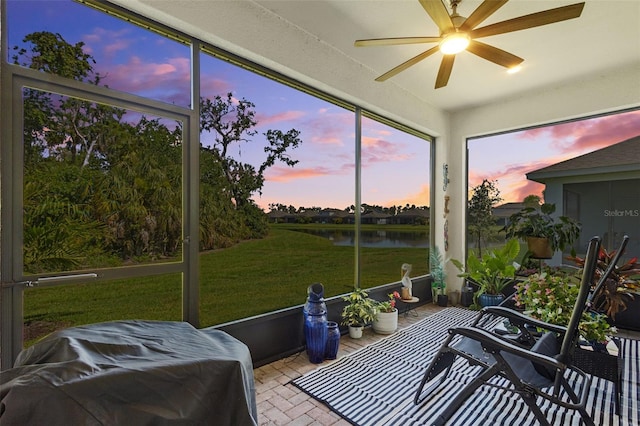 5816 Mezzana Run, Palmetto, FL 34221 - sunroom featuring a water view and a ceiling fan