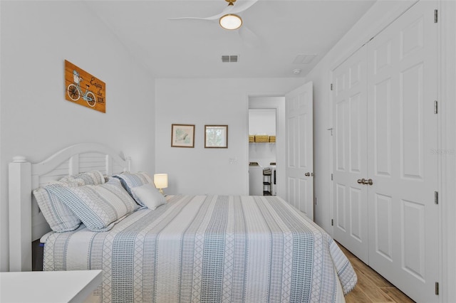5816 Mezzana Run, Palmetto, FL 34221 - bedroom with light wood-type flooring, ceiling fan, and a closet