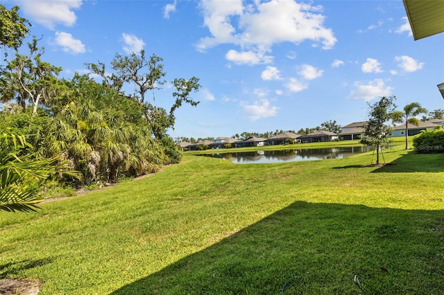 5816 Mezzana Run, Palmetto, FL 34221 - view of green lawn featuring a water view and a residential view