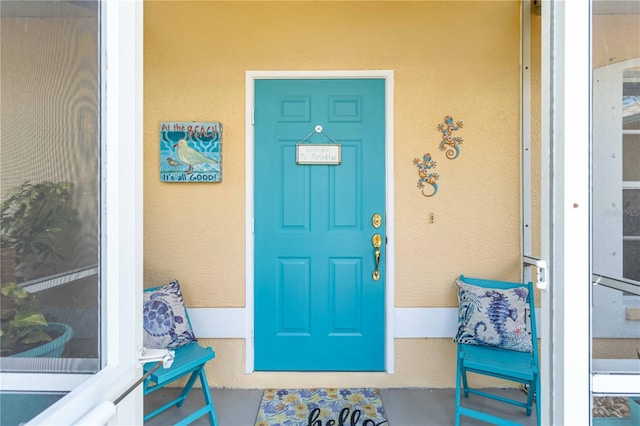 2801 Dalhart Ave, North Port, FL 34286 - doorway to property featuring stucco siding