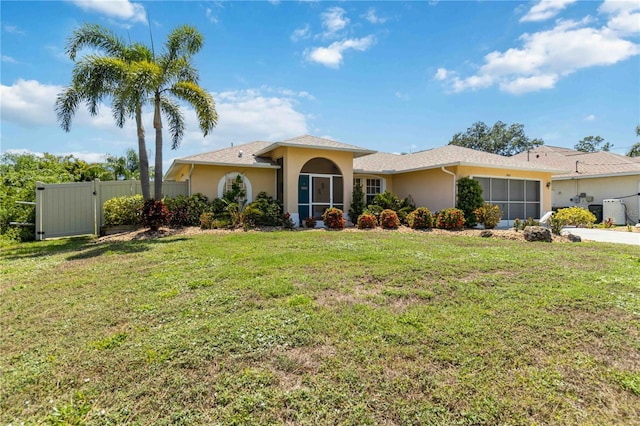 2801 Dalhart Ave, North Port, FL 34286 - ranch-style house with stucco siding, a garage, a gate, and driveway