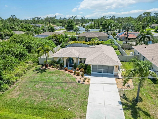 2801 Dalhart Ave, North Port, FL 34286 - aerial view of residential area featuring a tree filled landscape
