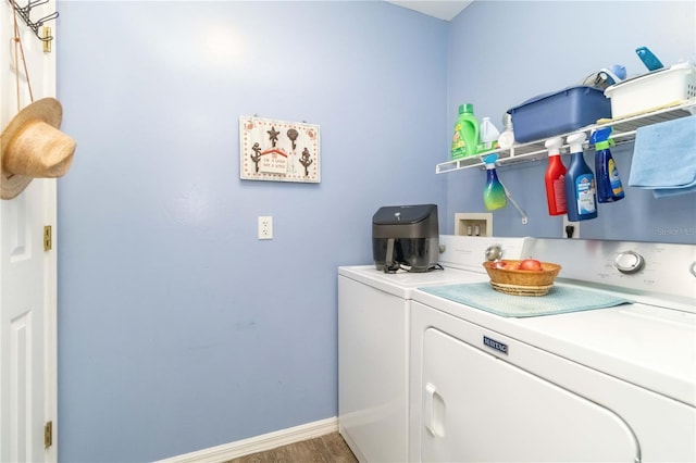 2801 Dalhart Ave, North Port, FL 34286 - washroom with washing machine and clothes dryer, baseboards, and wood finished floors