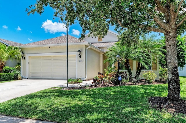 11811 Fennemore Way, Parrish, FL 34219 - view of front of house with stucco siding, concrete driveway, an attached garage, a front yard, and a shingled roof