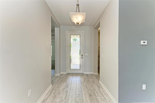 11811 Fennemore Way, Parrish, FL 34219 - entrance foyer with light wood-type flooring and baseboards