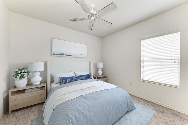 11811 Fennemore Way, Parrish, FL 34219 - bedroom featuring light carpet, baseboards, and a ceiling fan