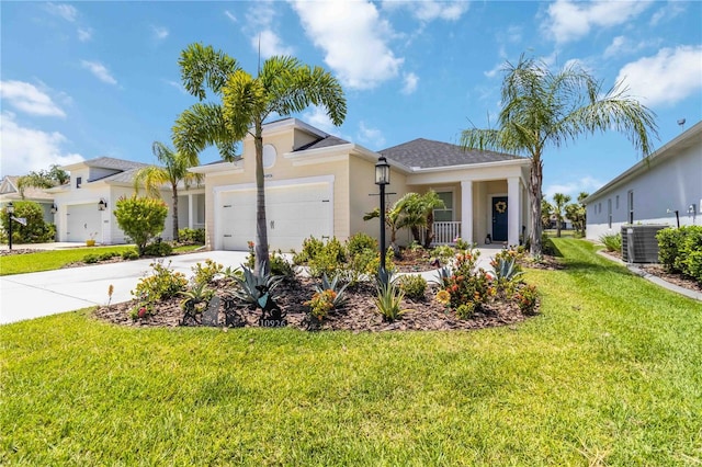 10926 Sand Pine Ln, Parrish, FL 34219 - single story home featuring cooling unit, an attached garage, concrete driveway, a front yard, and stucco siding