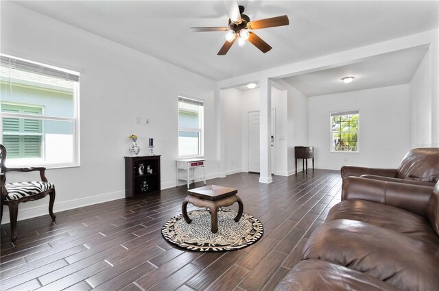 10926 Sand Pine Ln, Parrish, FL 34219 - living room featuring a ceiling fan, dark wood-style floors, and baseboards