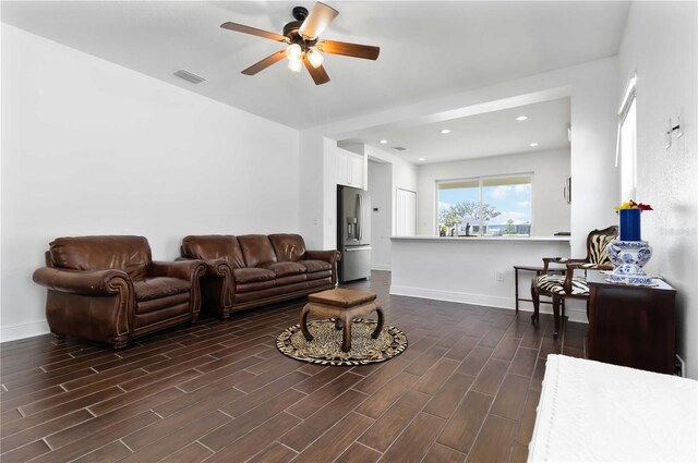 10926 Sand Pine Ln, Parrish, FL 34219 - living area featuring dark wood-style flooring, ceiling fan, baseboards, and recessed lighting