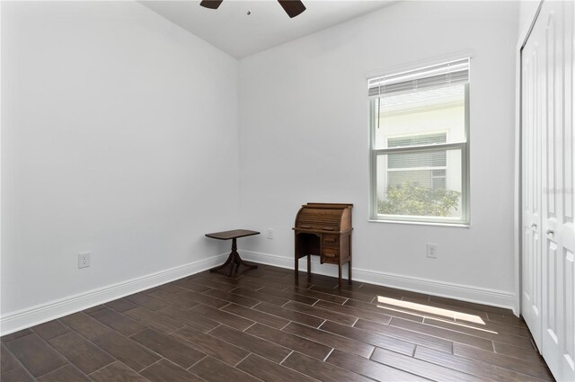 10926 Sand Pine Ln, Parrish, FL 34219 - spare room featuring a ceiling fan, wood finish floors, baseboards, and vaulted ceiling