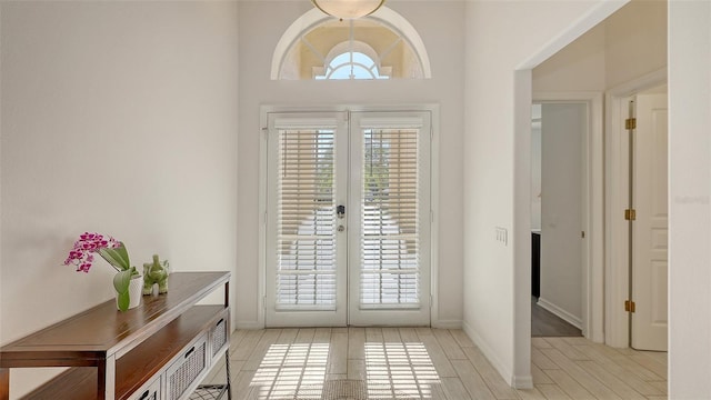 6721 Oak Manor Dr, Lakewood Ranch, FL 34202 - entryway featuring french doors and light wood finished floors