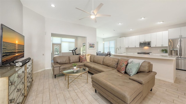 6721 Oak Manor Dr, Lakewood Ranch, FL 34202 - living area with a ceiling fan, light wood-type flooring, baseboards, and recessed lighting