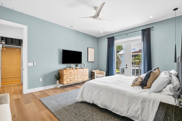 bedroom with french doors, access to exterior, wood finished floors, baseboards, and recessed lighting