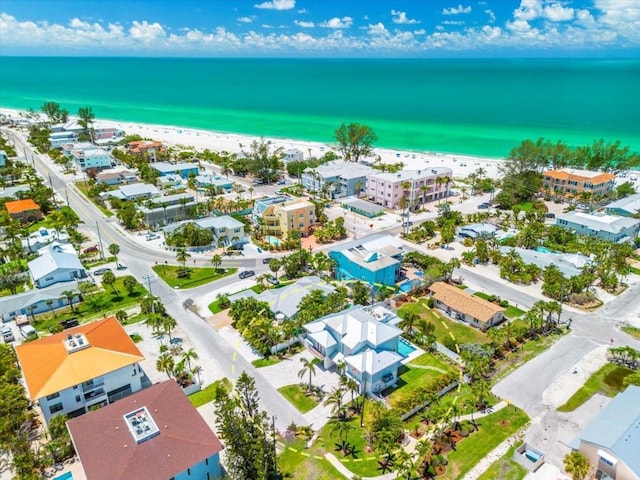 aerial view of waterfront with a beach