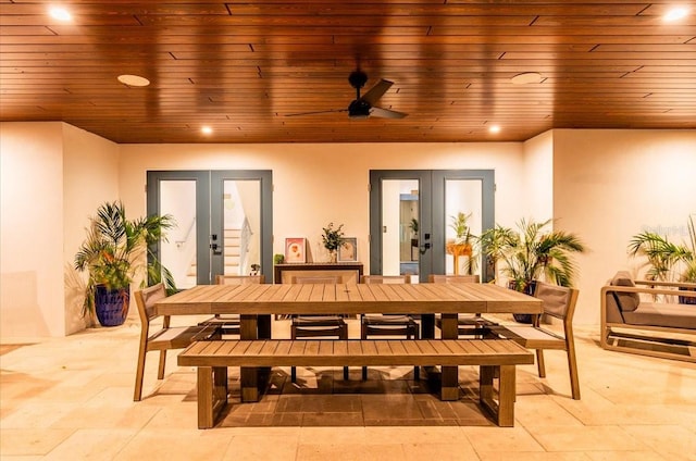 dining space with french doors, a ceiling fan, wood ceiling, and recessed lighting