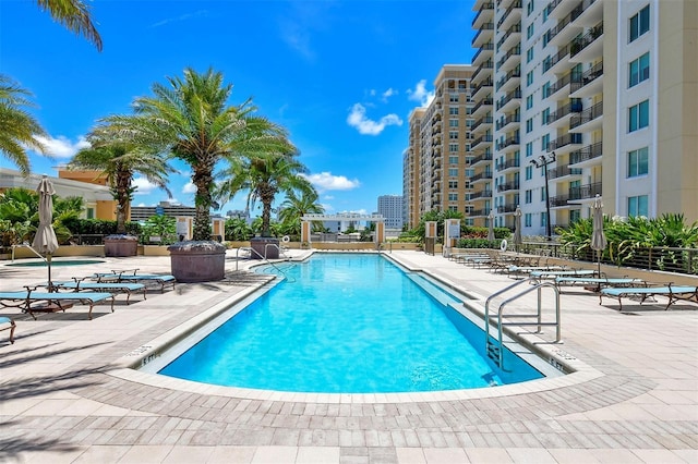800 N Tamiami Trl Unit 317, Sarasota, FL 34236 - community pool featuring a patio area