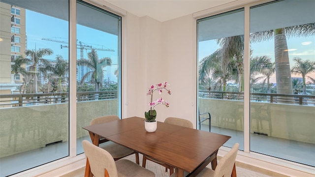 800 N Tamiami Trl Unit 317, Sarasota, FL 34236 - dining space with expansive windows