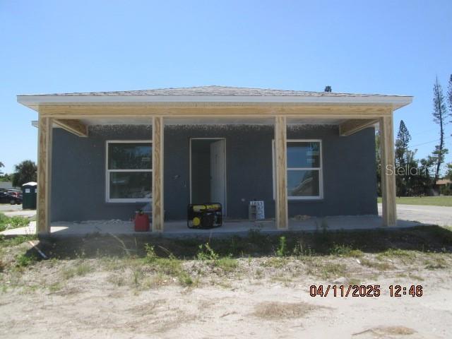 2206 53rd Ave E, Bradenton, FL 34203 - rear view of property with stucco siding