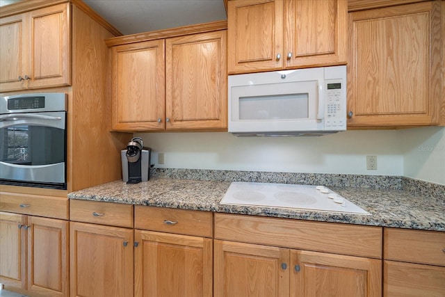 3335 Meadow Run Ter, Venice, FL 34293 - kitchen with white appliances and light stone counters