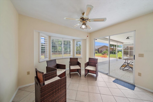 3335 Meadow Run Ter, Venice, FL 34293 - sitting room with plenty of natural light, baseboards, ceiling fan, and light tile patterned flooring