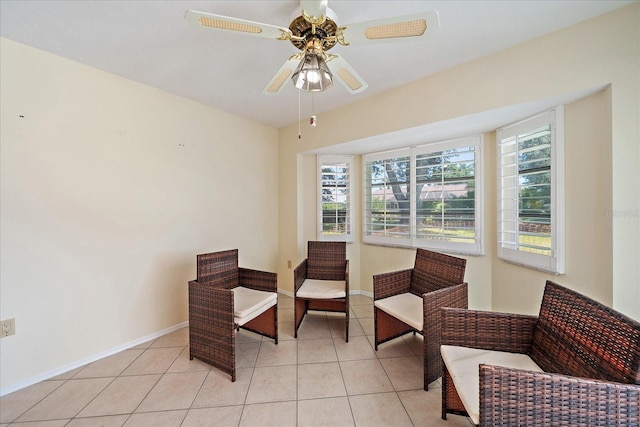 3335 Meadow Run Ter, Venice, FL 34293 - sitting room with a ceiling fan, light tile patterned floors, and baseboards