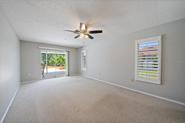 3335 Meadow Run Ter, Venice, FL 34293 - spare room featuring ceiling fan, baseboards, carpet flooring, and a textured ceiling
