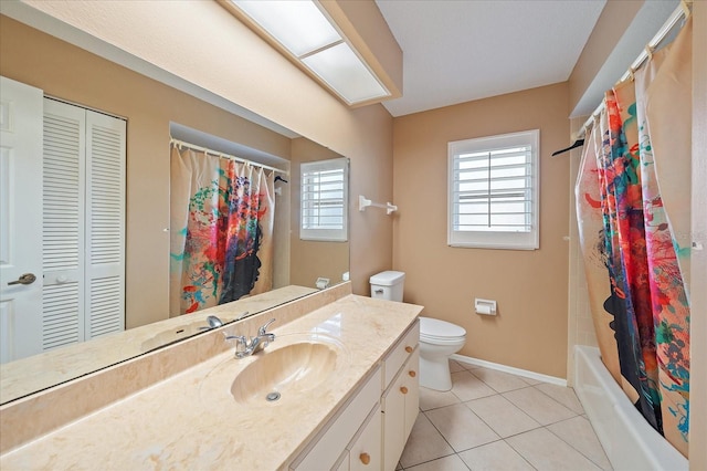 3335 Meadow Run Ter, Venice, FL 34293 - bathroom featuring toilet, plenty of natural light, tile patterned flooring, and vanity