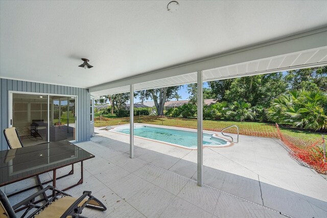 3335 Meadow Run Ter, Venice, FL 34293 - swimming pool with a patio and a lawn