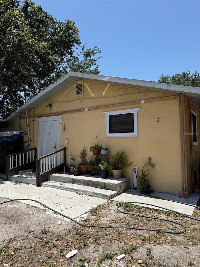 3720 27th St E, Bradenton, FL 34208 - view of front of house featuring stucco siding and a patio