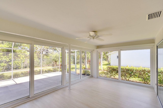 5812 Garden Lakes Fern, Bradenton, FL 34203 - unfurnished sunroom with ceiling fan and wood finished floors