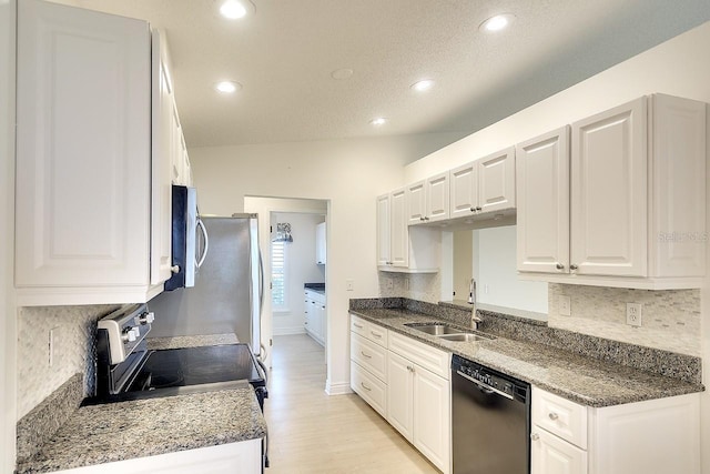 5812 Garden Lakes Fern, Bradenton, FL 34203 - kitchen featuring stainless steel appliances, a sink, white cabinets, and recessed lighting