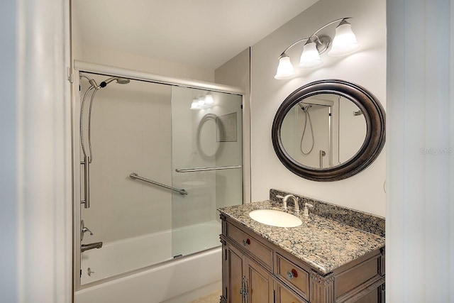 5812 Garden Lakes Fern, Bradenton, FL 34203 - bathroom featuring vanity and bath / shower combo with glass door