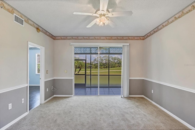 8755 Olde Hickory Ave Unit 7105, Sarasota, FL 34238 - unfurnished room with carpet, a textured ceiling, a ceiling fan, and baseboards