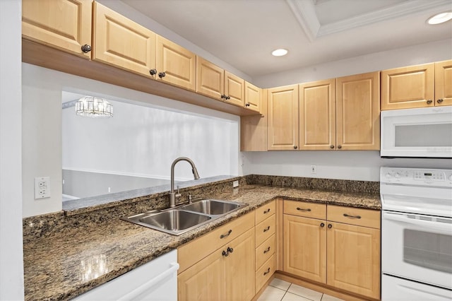 8755 Olde Hickory Ave Unit 7105, Sarasota, FL 34238 - kitchen featuring white appliances, light brown cabinets, a sink, recessed lighting, and dark stone countertops
