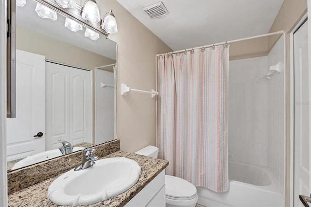8755 Olde Hickory Ave Unit 7105, Sarasota, FL 34238 - bathroom featuring toilet, shower / bath combination with curtain, and vanity