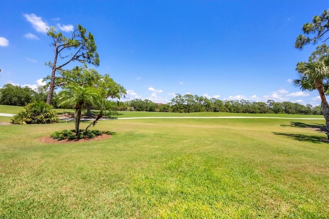 8755 Olde Hickory Ave Unit 7105, Sarasota, FL 34238 - view of green lawn with golf course view and view of scattered trees