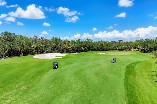 8755 Olde Hickory Ave Unit 7105, Sarasota, FL 34238 - view of home's community featuring golf course view and view of scattered trees
