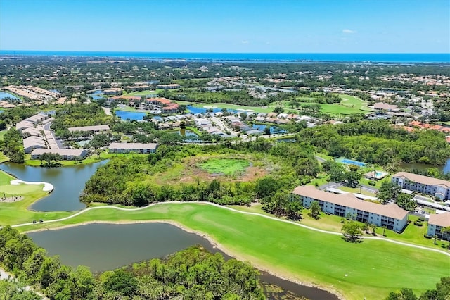 8755 Olde Hickory Ave Unit 7105, Sarasota, FL 34238 - aerial view of residential area with a golf course, a nearby body of water, and a tree filled landscape