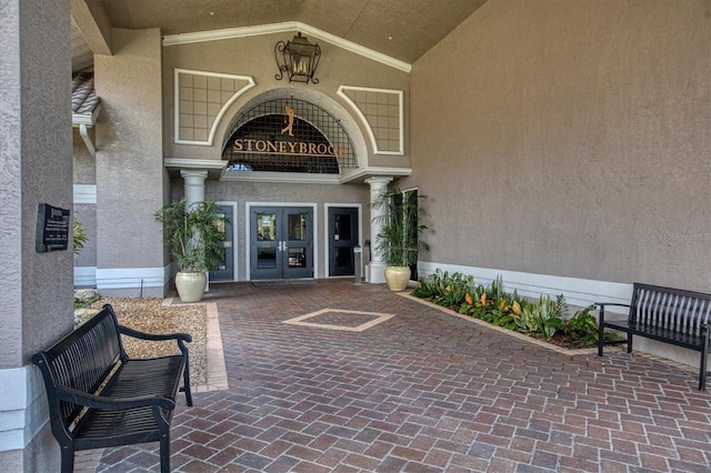8755 Olde Hickory Ave Unit 7105, Sarasota, FL 34238 - property entrance featuring stucco siding and french doors